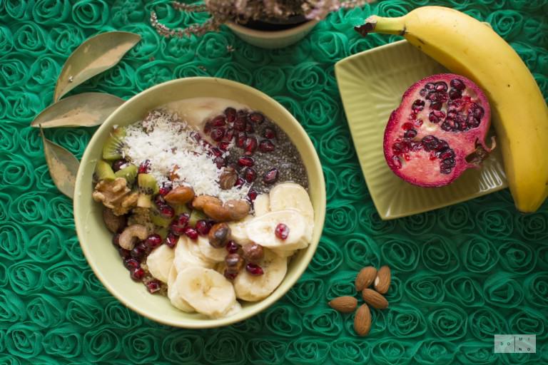 Quinoa bowl with fruits, nuts and chia seeds